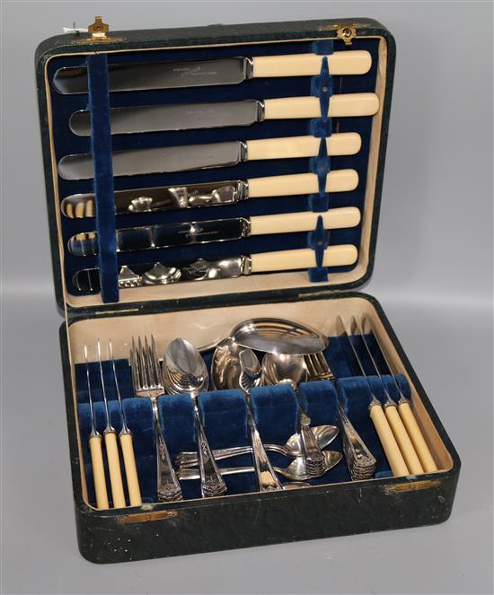A leather cased six setting canteen of cutlery